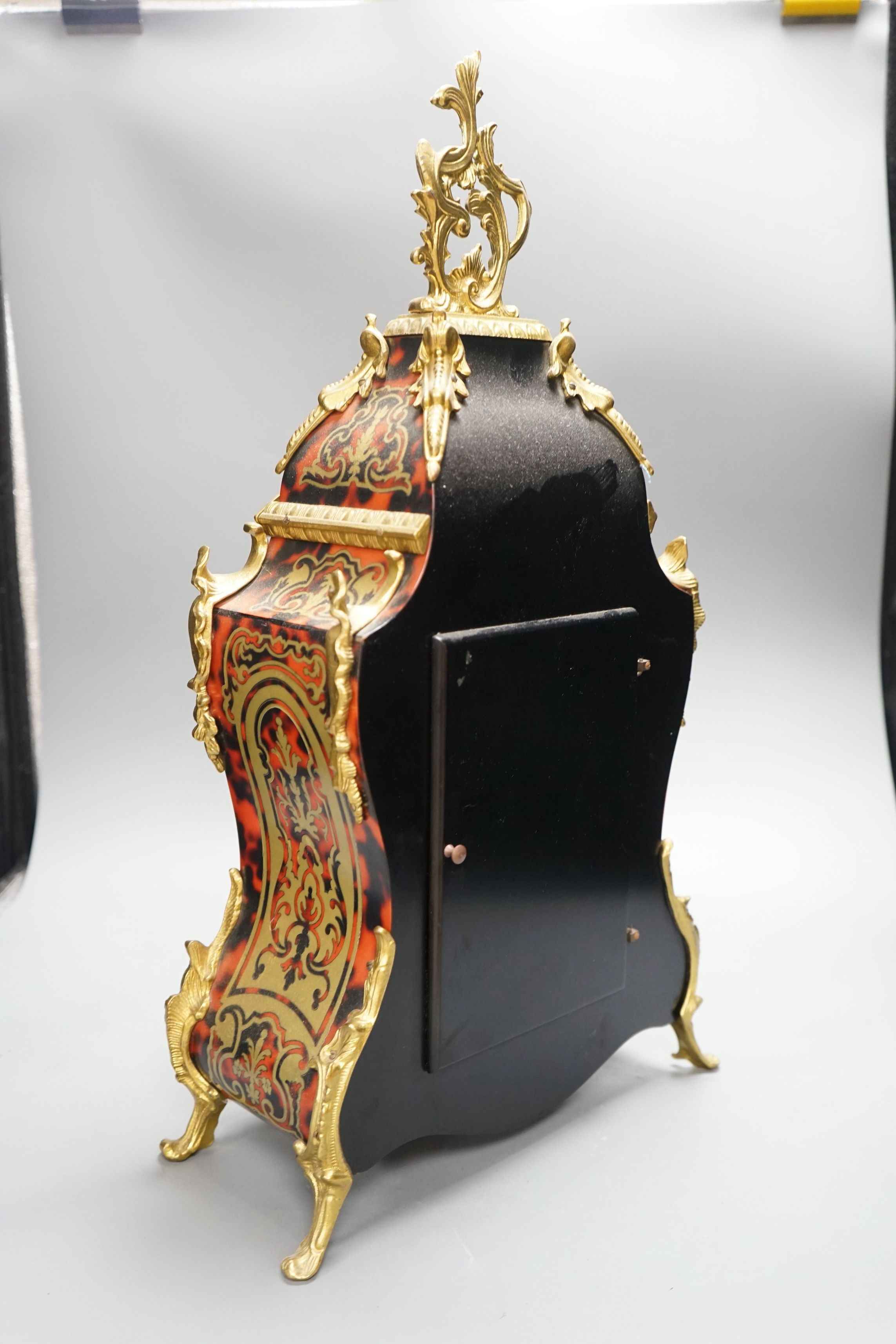 A boulle bracket clock, 58cms high